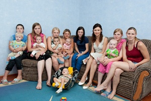 Olga Kurylenko at a mother and baby home