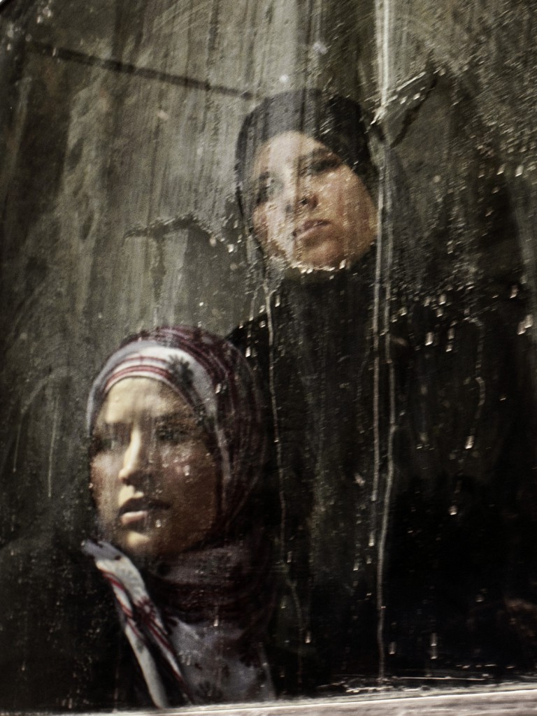 Tunisia, October 2011. Women look out of a train window. Moises Saman/MAGNUM