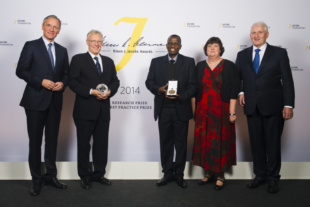 From left to right: Christian Jacobs; 2014 research prize recipient Michael J Meaney; 2014 best practice prize recipients: Philipp Chimponda, Beth McKenna and Father Baxter of SHARPZ.
