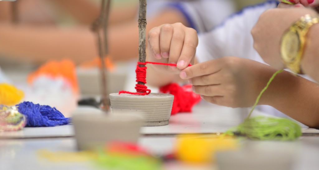Six-year-olds creating small trees at a municipal school in Brazil. The teacher won the 15th Art Award in the Citizen School in 2014. The awards are supported by the Ioschpe Foundation.