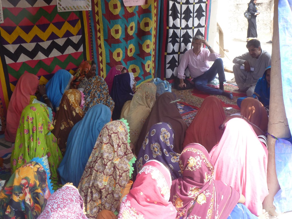 Nick van Praag of Keystone’s Ground Truth project meets with locals of Pakistan's Sindh Province in 2013 to see if they're satisfied with efforts to help them recover from floods.
