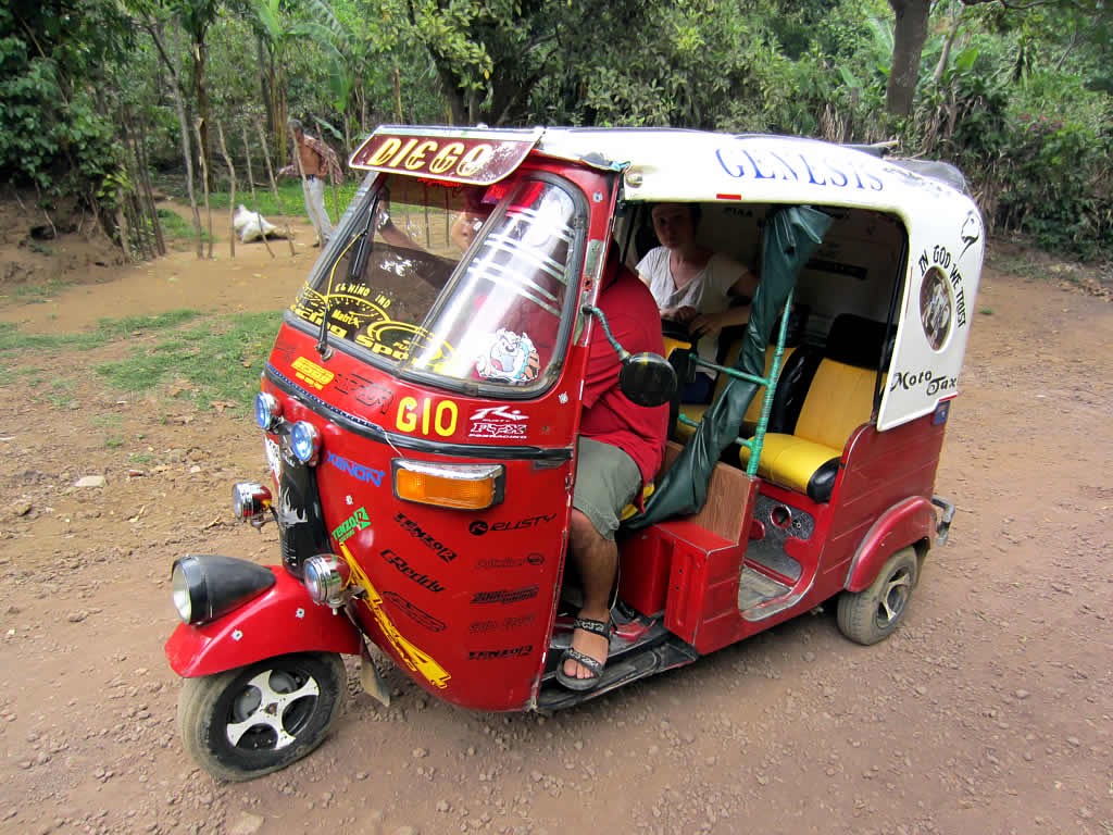 Three-wheel taxi in Juayua, El Salvador., CREDIT: David Stanley