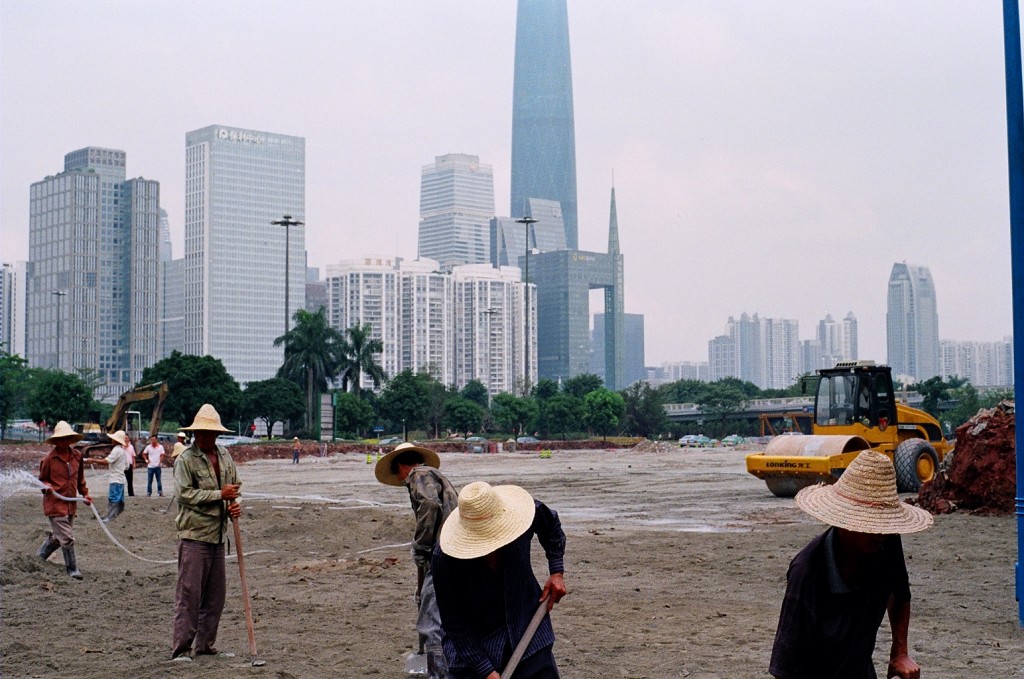 China has seen recent massive internal migration to urban centers in search of economic opportunity. Here construction workers from the countryside labour in front of Guangzhou’s glittering skyline.