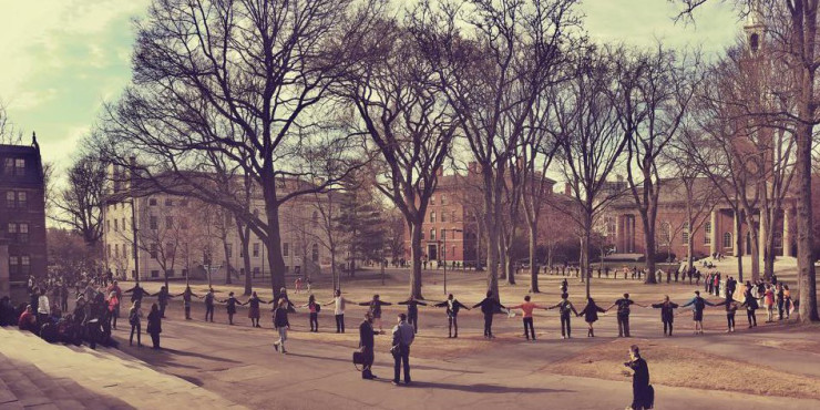 Divest Harvard encircles Harvard Yard during Harvard Heat Week in April 2015.