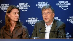Melinda French Gates (left) looks at Bill Gates (right) during a speech at the World Economic Forum in 2009