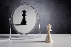 Chess Character knight warrior reflection in a mirror-represent hypocrisy personality