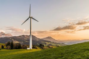 Wind farm sunset and mountains